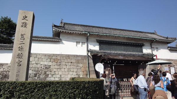 a small crowd at the entranceway